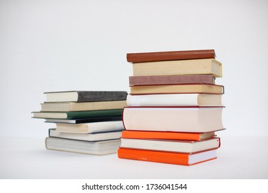 Stack of books on white background
