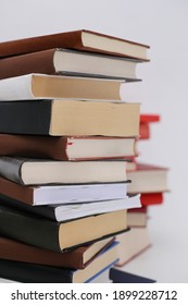 Stack of books on white background