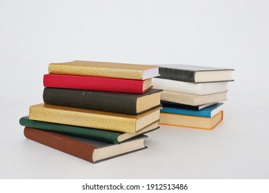 Stack Of Books On White Background