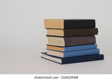 Stack Of Books On White Background