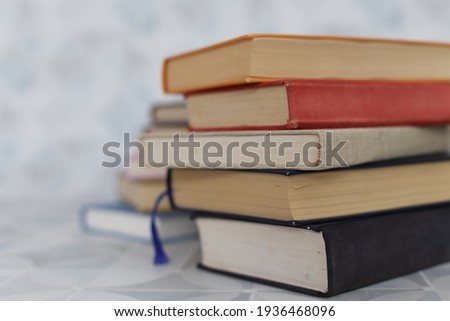Stack of books on white background