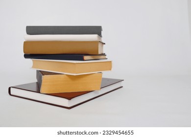 Stack of Books on white background_eduaction_school_library - Powered by Shutterstock