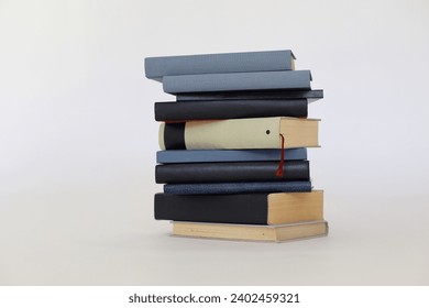 stack of books on white wooden table against grey background. space for text - Powered by Shutterstock