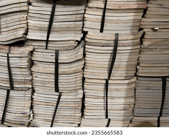 stack of books, pile of books background Many Books Piles. Hardback books on wooden table. Back to school. old book