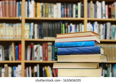 Stack of books in public library - Shutterstock ID 1610636335