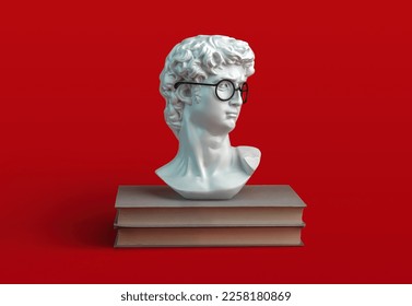 stack books   sculpture David's head and eyeglasses red background  Student   education concept