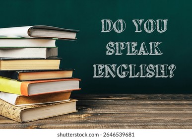 Stack of books with the words Do you speak English written on top. The books are arranged in a pyramid shape, with the top book being the largest and the bottom book being the smallest