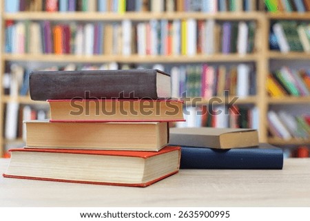 stack of books,stack of books on white blurred background, education, reading, 
High quality photos of books, school, library, William Shakespeare, literature, novels, short stories, poetry, editorial