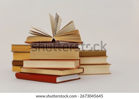 stack of books,stack of books on white blurred background, education, reading, 
High quality photos of books, school, library, William Shakespeare, literature, 
