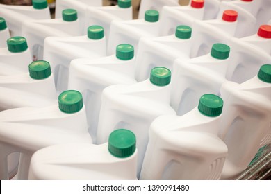 Stack With A Lot Of Bottles Cleaning Agent. Close-up Of Caps. Concept Of Retail Or Wholesale. DIY Shopping Center With Household Products. 