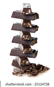 stack of broken chocolate isolated on white