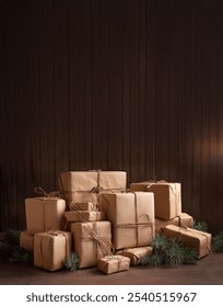 stack of brown kraft paper boxes gift wrap packages tied with jute string with pine boughs and wall space to add text for social media post