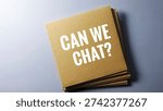 Stack of Brown Square Cards with Can We Chat Text, Communication and Support Concept, Feedback Request, Conversation Invitation, Minimalist Design. 