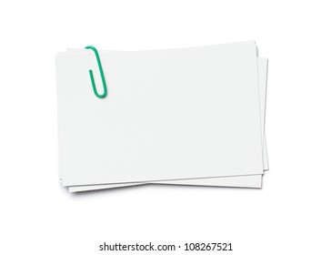 Stack of business cards with paper clip isolated on white background with clipping path