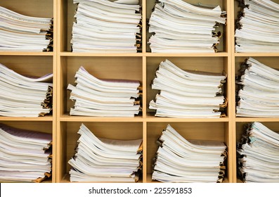 Stack Of Business Papers On The Wood Shelf  