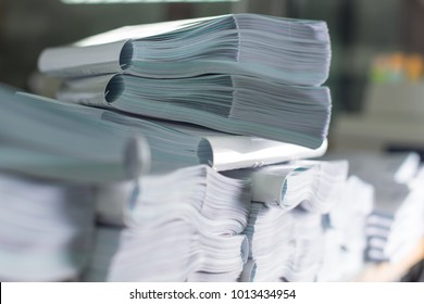 Stack of business report paper