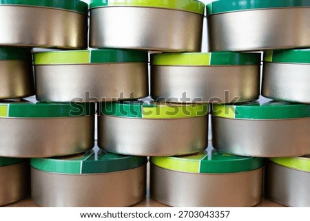 Stack of candy boxes on a shelf close-up