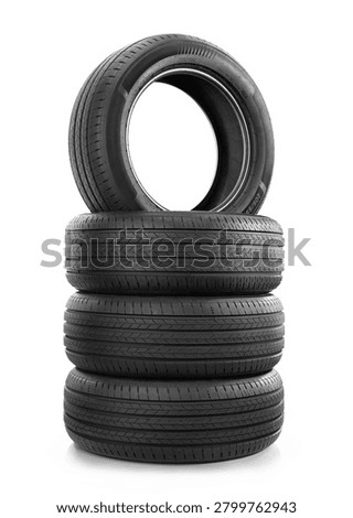 Stack of car tires isolated on white background. Car tires isolated on white background