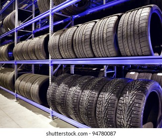 Stack Of Car Tires On Warehouse Closeup