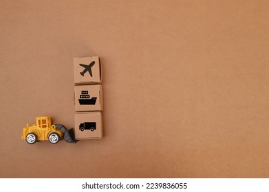 Stack of cardboard boxes and airplane with fast delivery of goods and products . Commodity trading, logistics, air cargo, parcels, airmail, shipping, fast delivery concept.