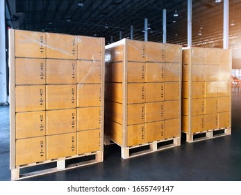 Stack cardboard boxes wrapping plastic on pallets, package boxes, loading freight truck , warehouse industrial service logistics, shipment goods transport