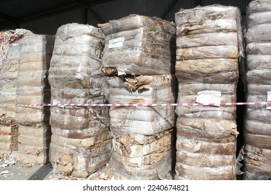 Stack of cardboard carton packed pile prepare for recycling on plant. Eco-friendly lifestyle zero waste concept. Environmental conversation technology. Garbage sorting. Ecology reuse green world idea. - Shutterstock ID 2240674821