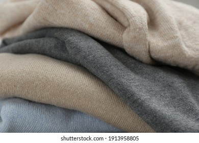 Stack Of Cashmere Clothes As Background, Closeup