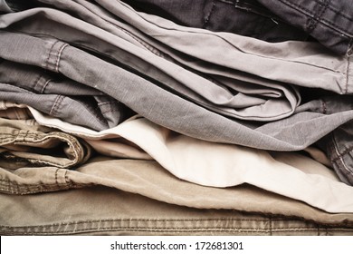 Stack of casual cotton men's trousers