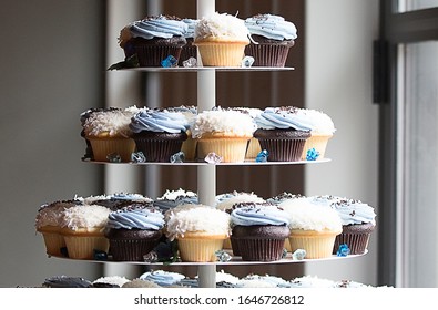 A stack of celebration cupcakes 