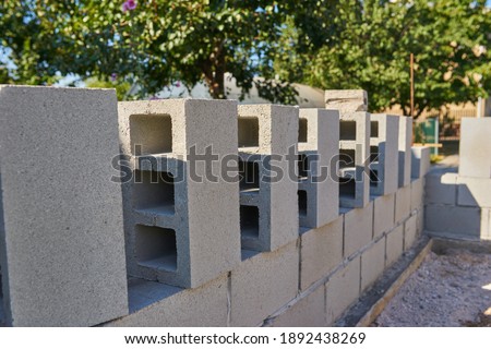 Stack of cement blocks at the construction site. 