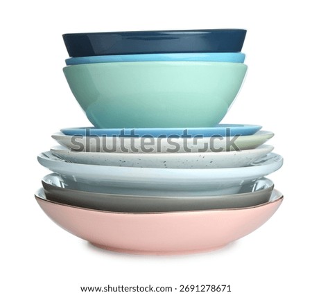 Stack of ceramic dishware isolated on white
