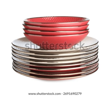 Stack of ceramic dishware isolated on white