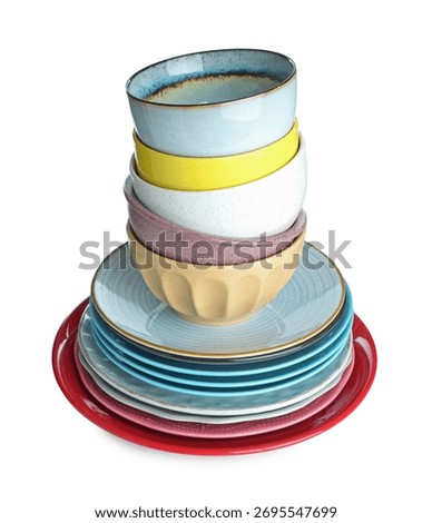 Stack of ceramic dishware isolated on white