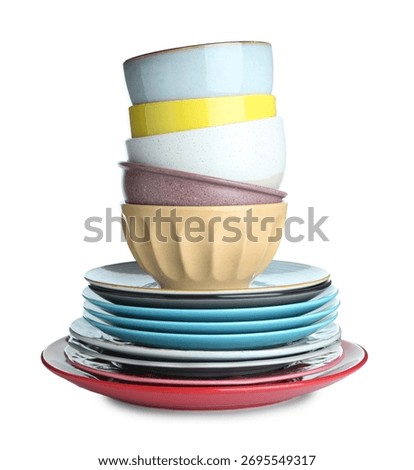 Stack of ceramic dishware isolated on white