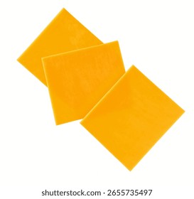 Stack of cheddar cheese slices, sliced natural cheese cheddar isolated on a white background, top view.