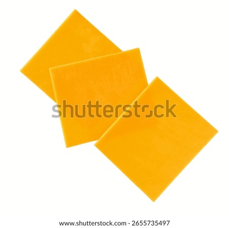 Stack of cheddar cheese slices, sliced natural cheese cheddar isolated on a white background, top view.