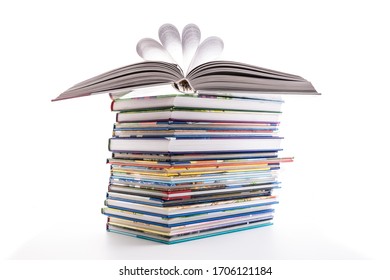 Stack Of Children's Books Isolated On White. Concept Of Learning, Education And Stody.