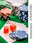 Stack of chips and cards on a table - poker game concept