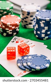 Stack of chips and cards on a table - poker game concept