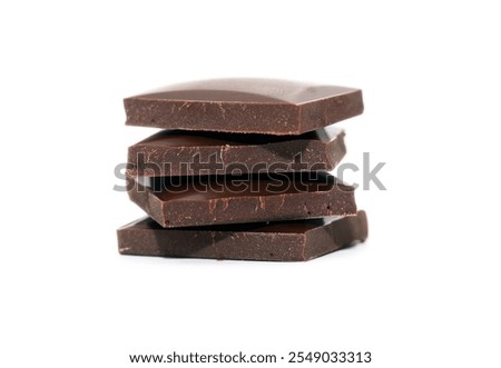 Stack of chocolate bars isolated on white background