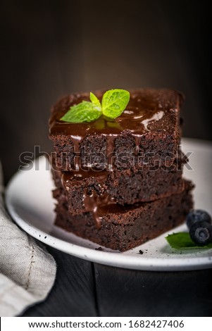 Similar – Foto Bild Schokoladenbrownie-Stücke auf Holzuntergrund