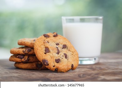 Stack of Chocolate chip cookie and glass of milk