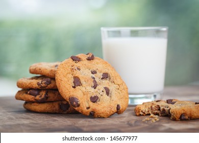 Stack Of Chocolate Chip Cookie And Glass Of Milk