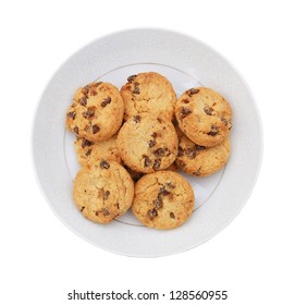 A Stack Of Chocolate Chip Cookies In Plate On A White Background.