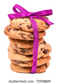 A Stack Of Chocolate Cookies Tied With Pink Ribbon Isolated On White Background