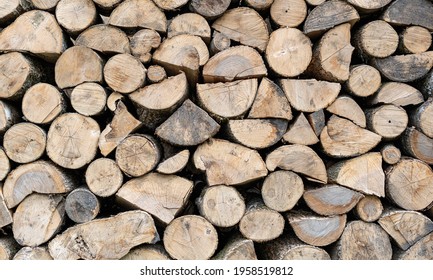 Stack of chopped firewood as an abstract background. - Shutterstock ID 1958519812
