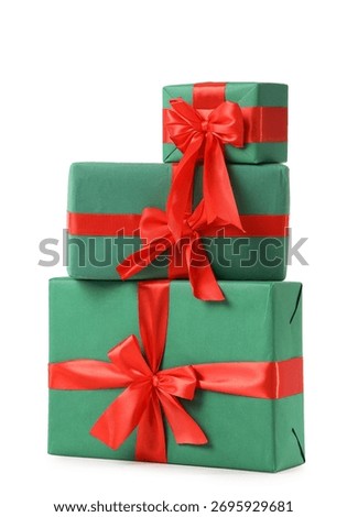 Stack of Christmas gift boxes on white background