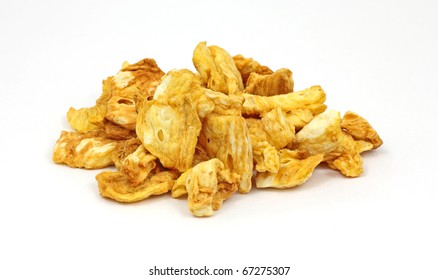 A Stack Of Cinnamon Coated Dried Pineapple Chunks.