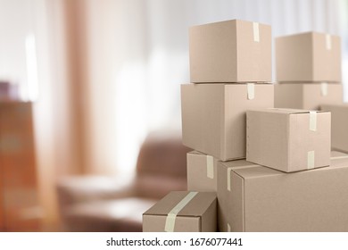 Stack of classic cardboard boxes in room