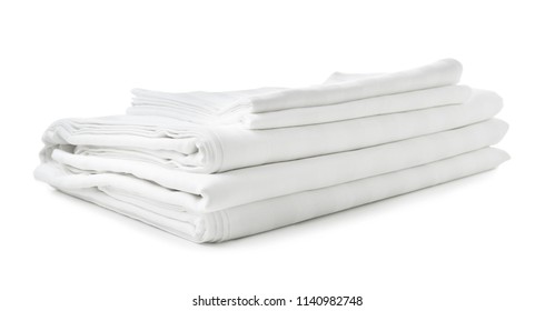 Stack Of Clean Bed Sheets On White Background